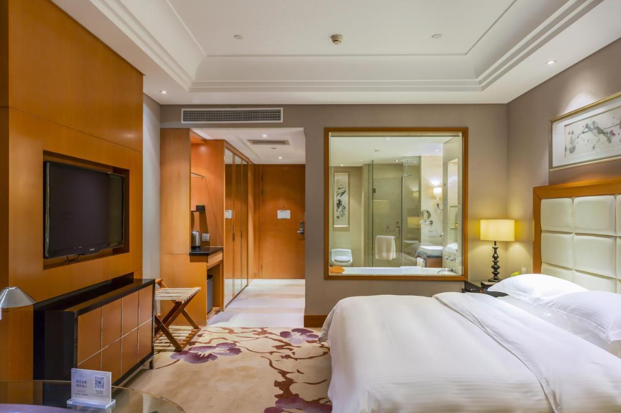 Wyndham Xinyang Downtown Hotel Buitenkant foto